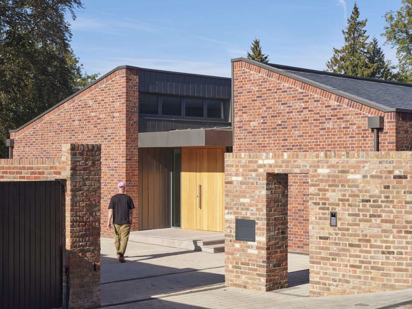 This Neo design in oak stands out beautifully from the brick building.