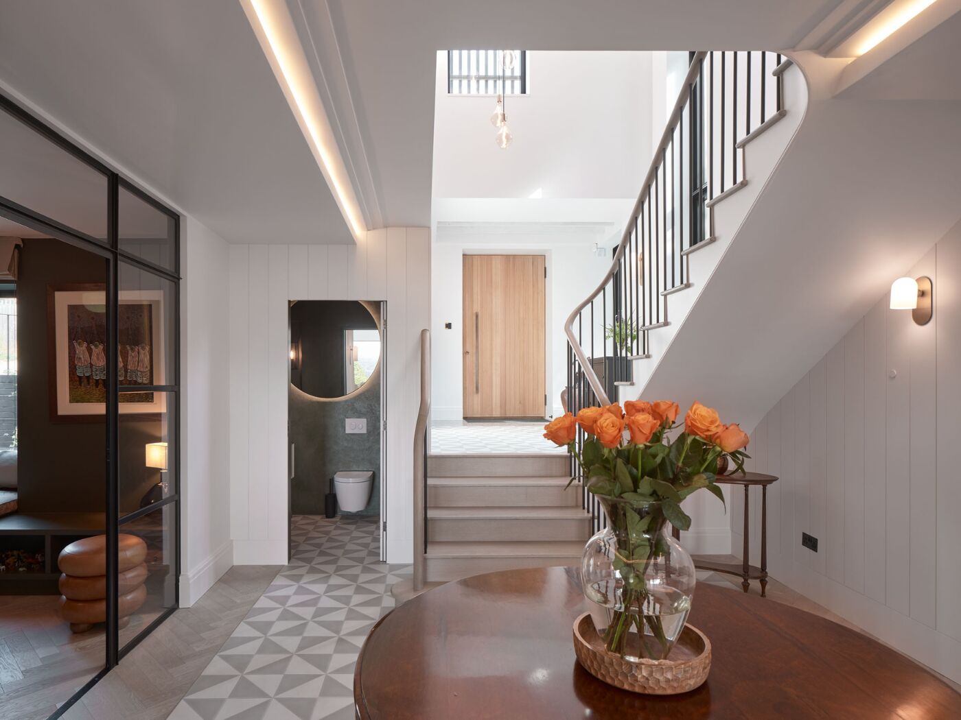 This Porto design in oak brings a warmth to the white walls of this contemporary home.