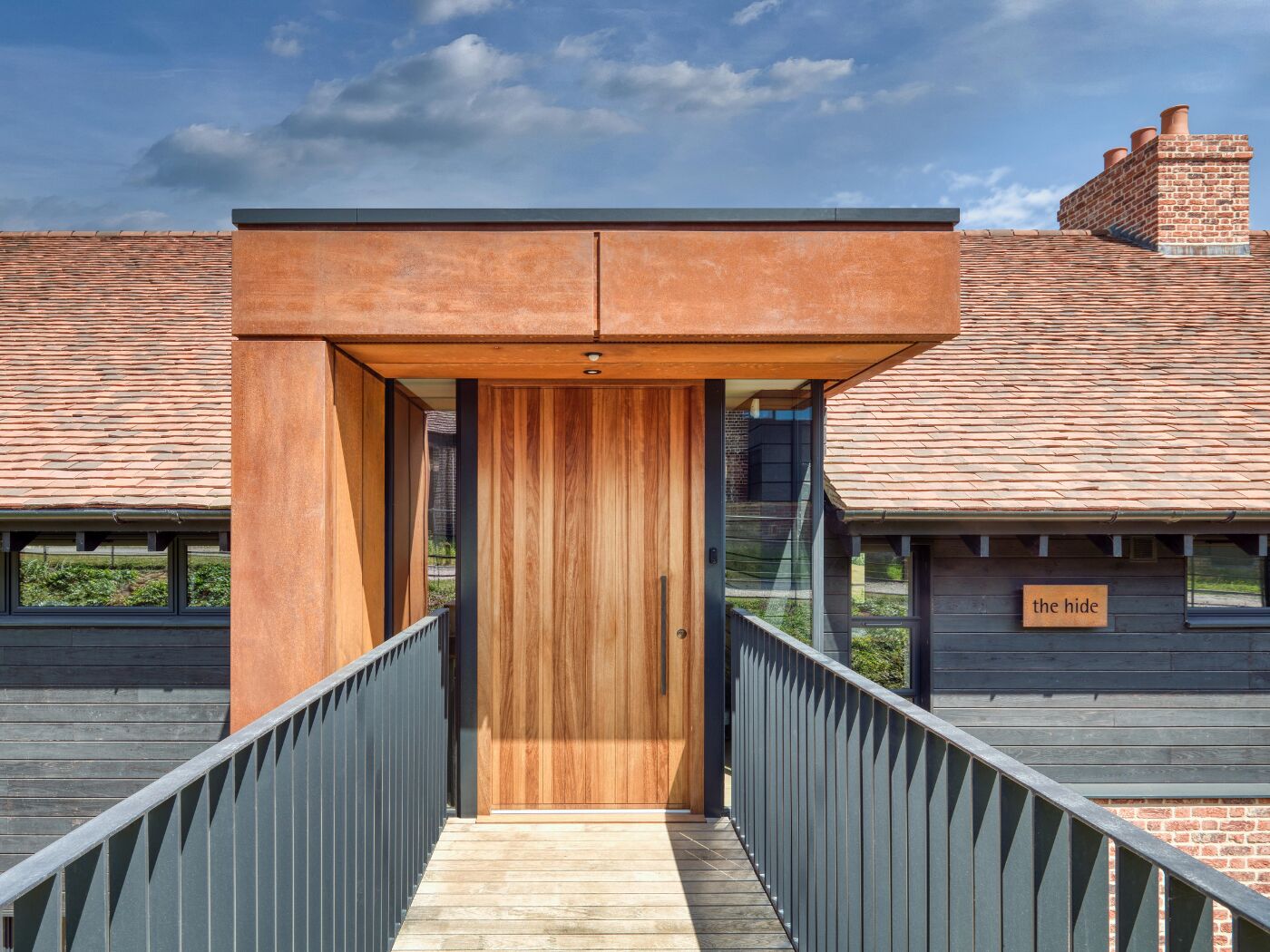 A statement entrance, including an iroko front door, for an award-winning home.