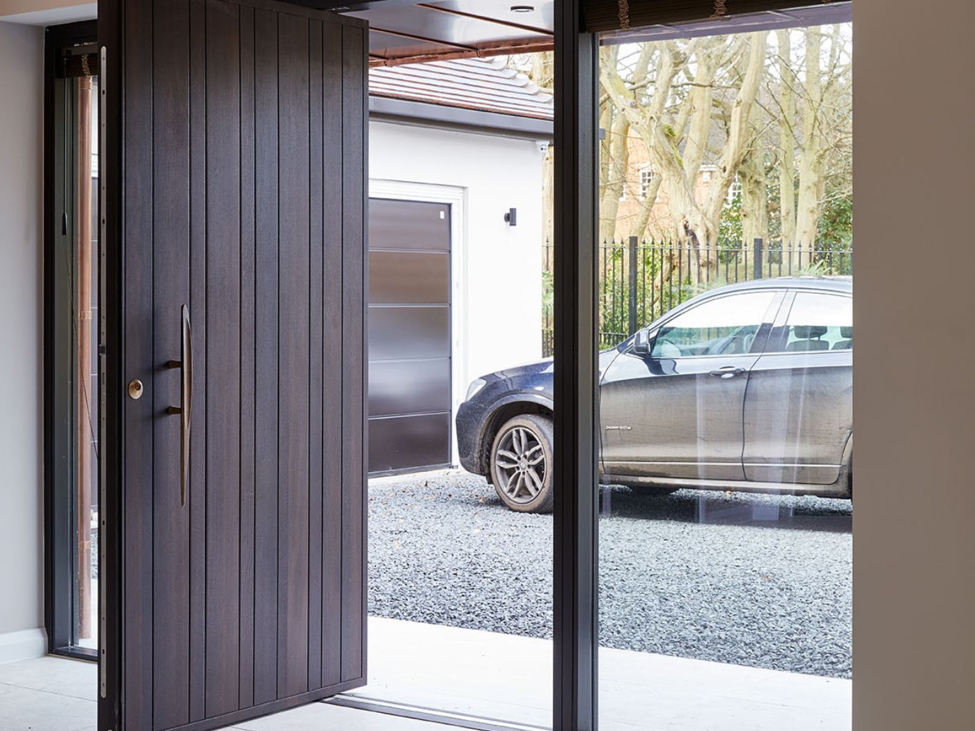 With contrasting vertial and horizontal lines, the fumed oak and garage door work perfectly together