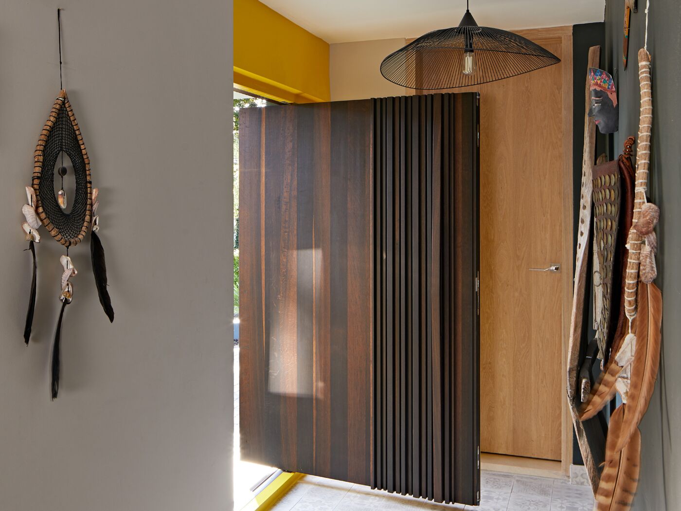 The Bari in fumed oak on the outside with yellow inside and an oak internal door