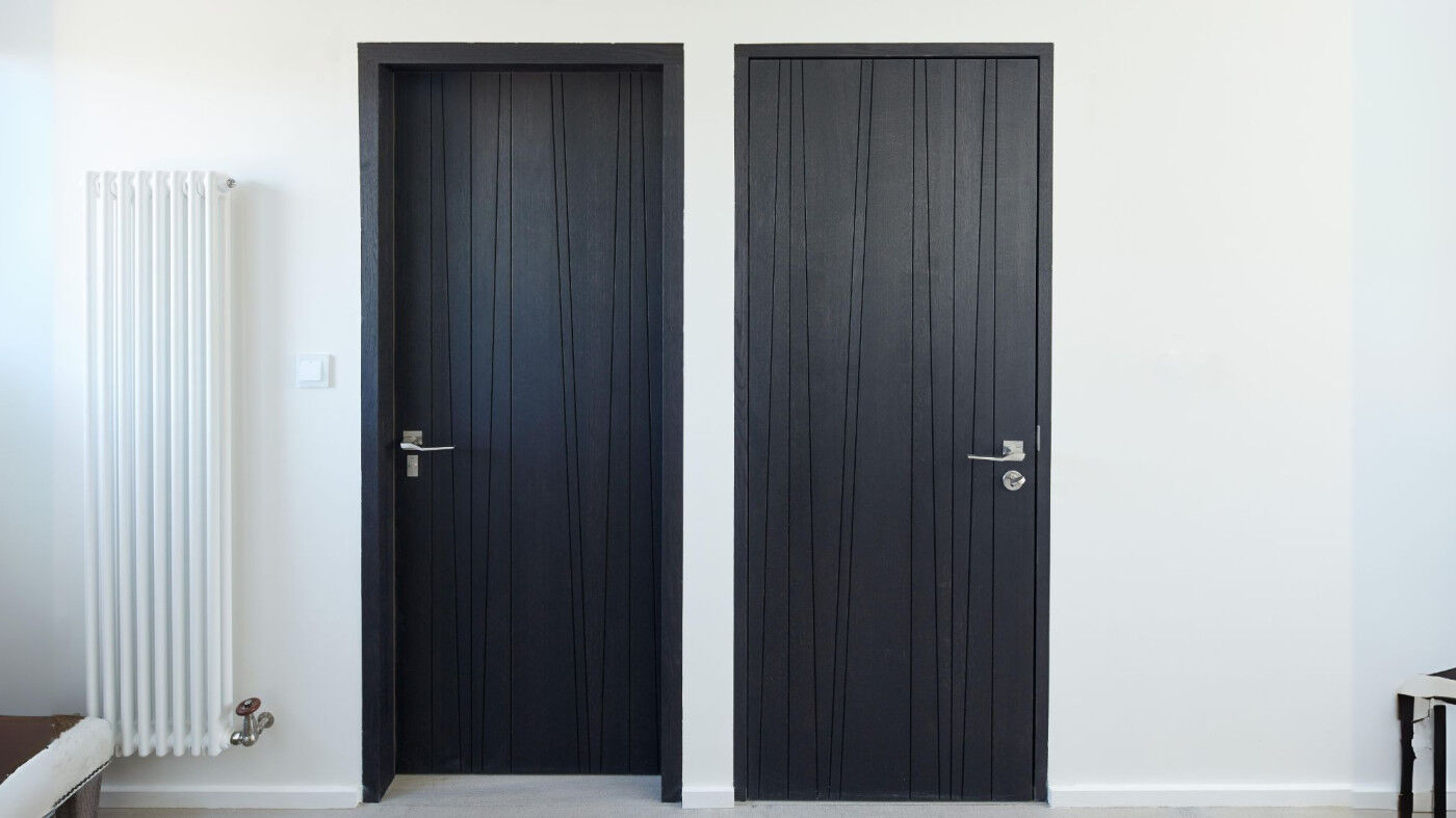 Internal oak doors in a Milano V design finished with ebony oil 