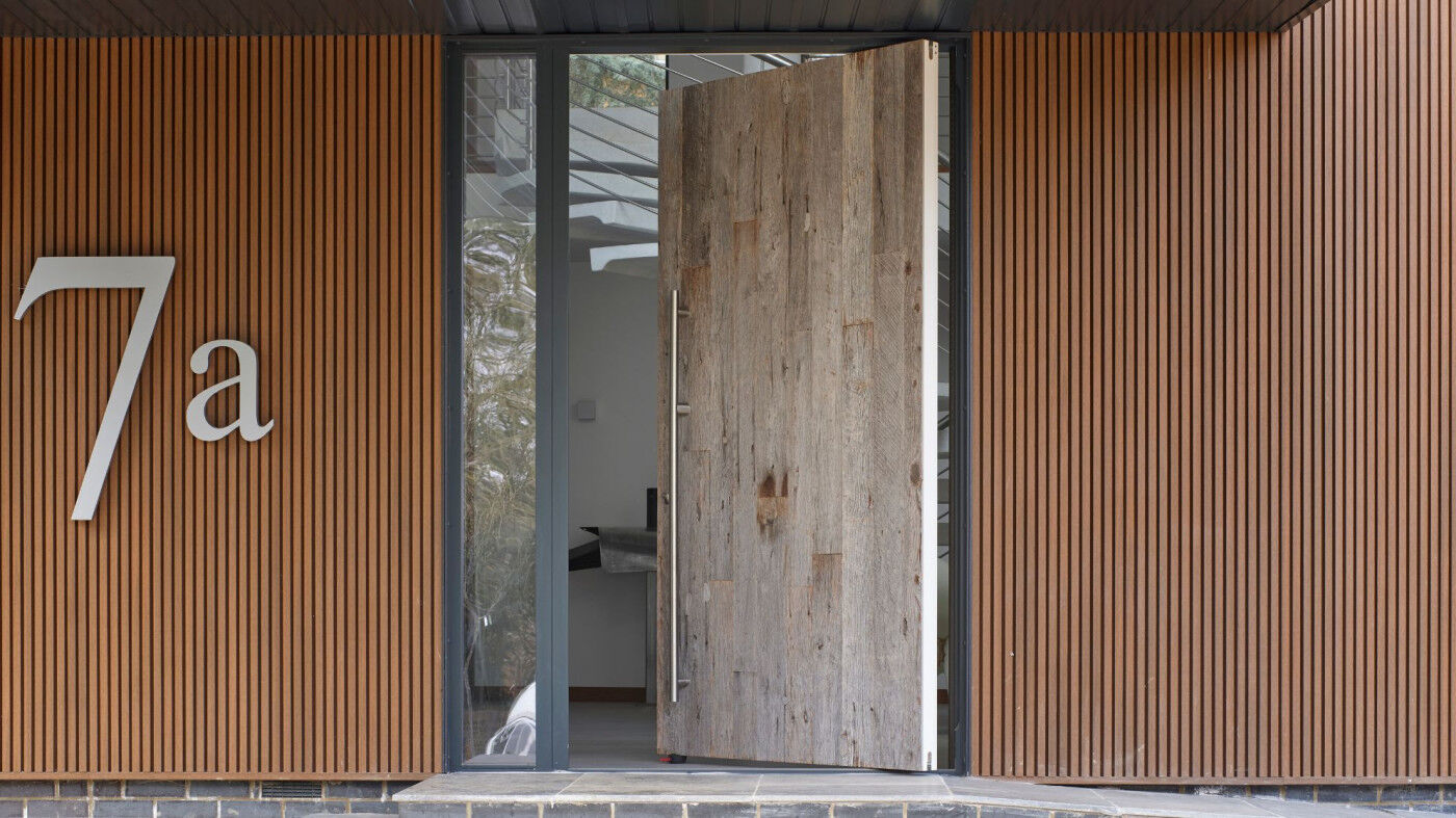 Pivot door in reclaimed barn wood and option 18 handle