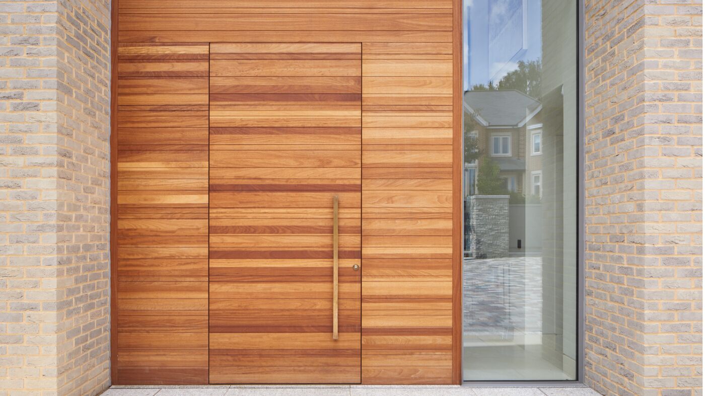 Flush Rondo front door in iroko with BZ5 handle