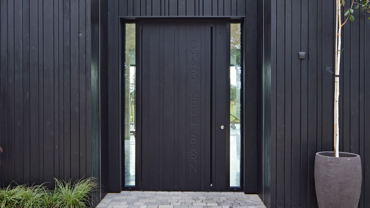 Rondo V front door oak with ebony oil and hidden handle.