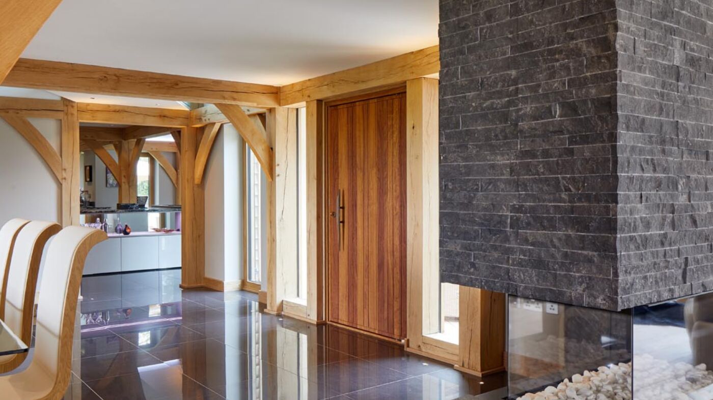 Rondo V pivot doorset in Iroko at 1.2m x 2.4m with Option BZ3 handle