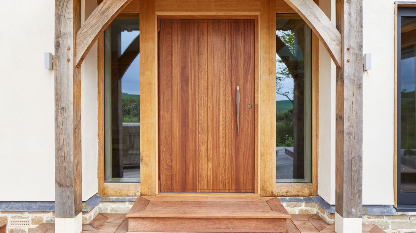 Rondo V pivot doorset in Iroko at 1.2m x 2.4m with Option BZ3 handle