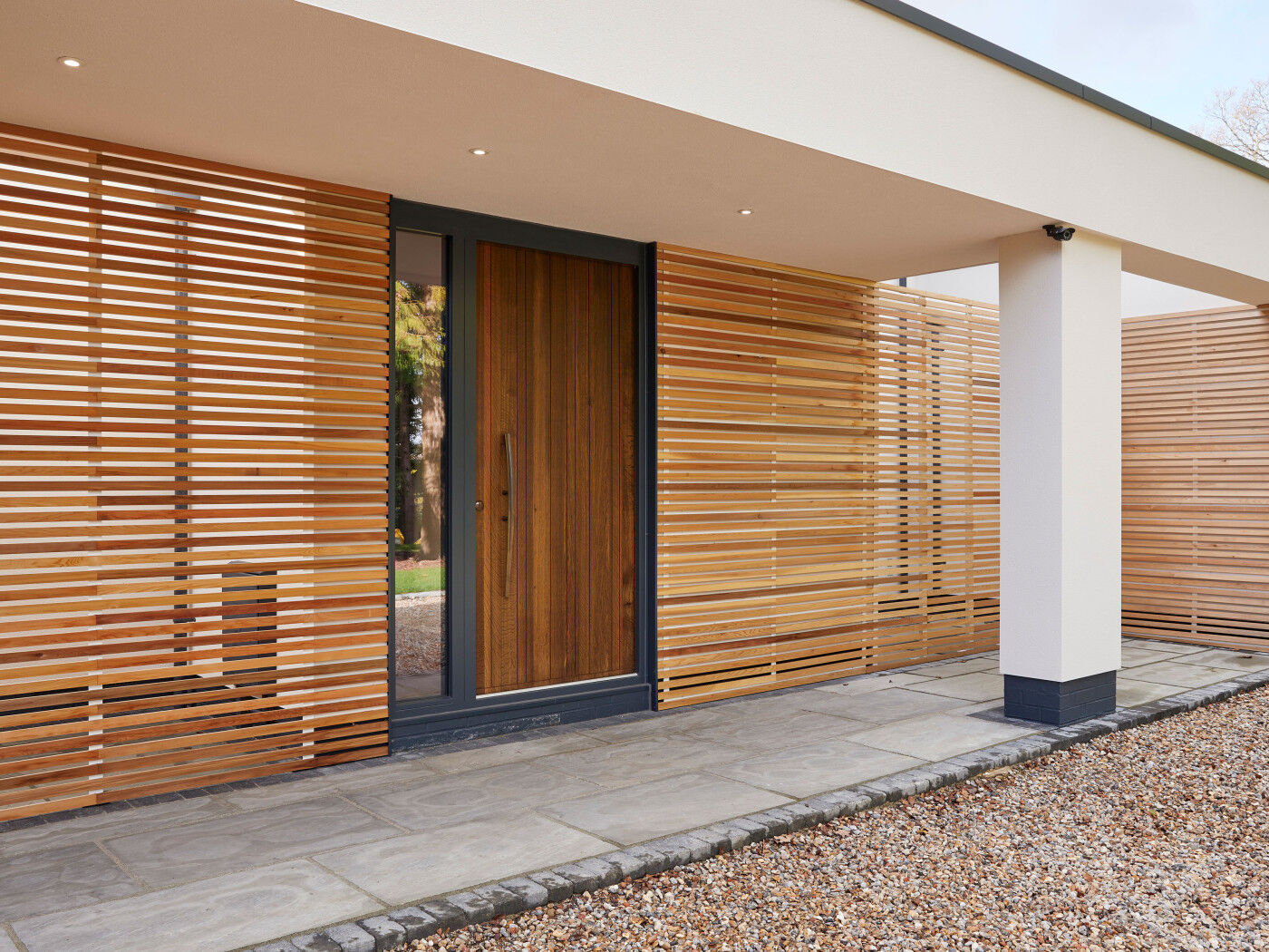 In fumed oak, this Rondo V is offset by off-white render and light oak cladding