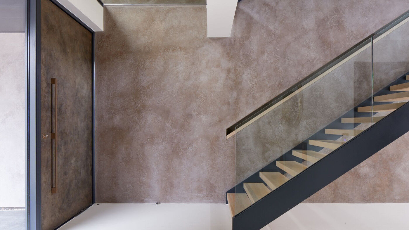 Textured bronze door with a BZ11 in bronze